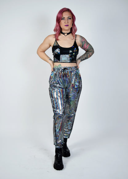 Unisex-music fesival fashion - Festival-outfit-rave-outfit - handmade-in-Brooklyn-New York City-custom made-waste conscious – psychedelic fashion – retro style – hippie fashion –handmade - Roadie Jogger– festival pants – rave pants - silver sparkle - mercury sparkle - on model