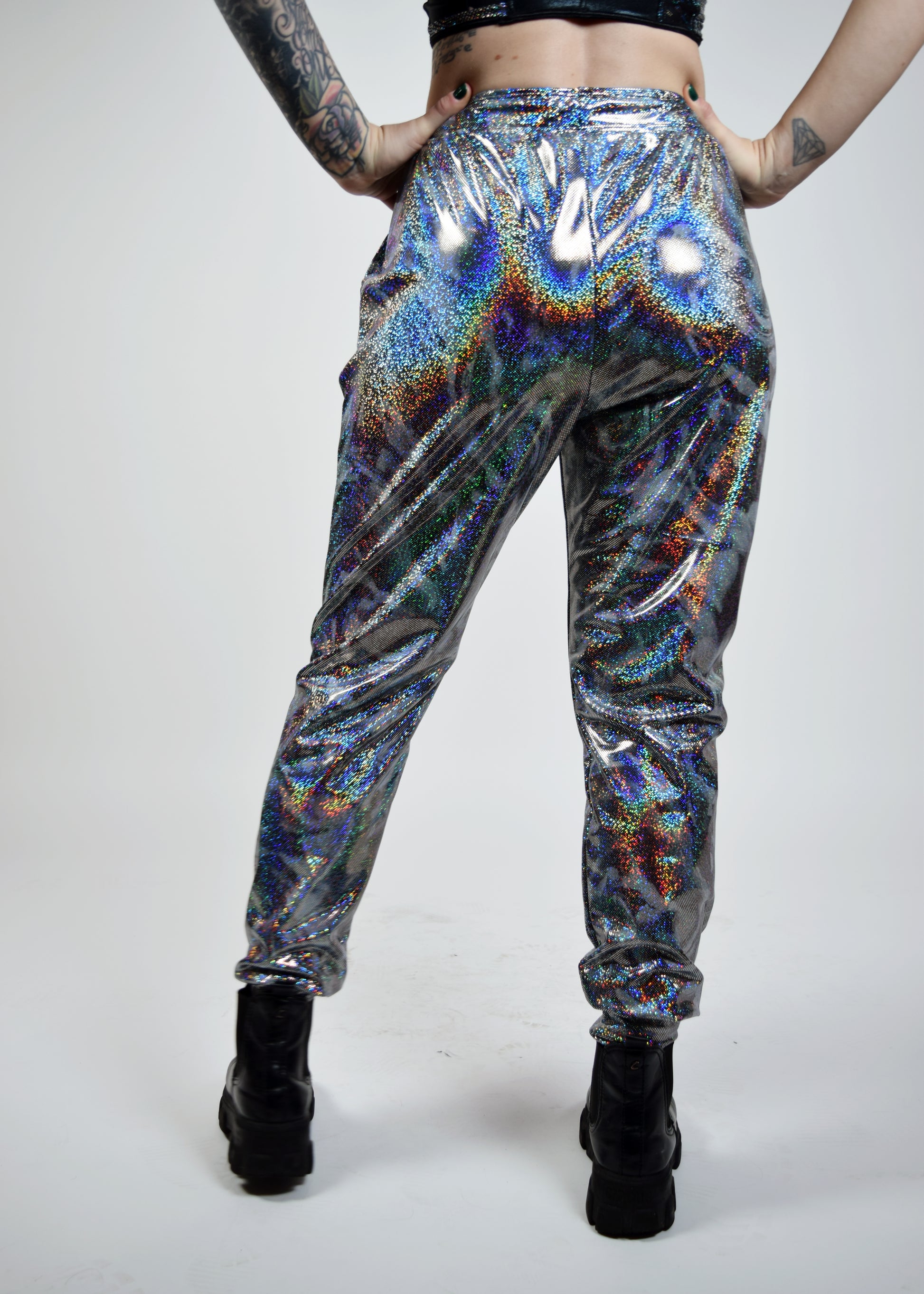Unisex-music fesival fashion - Festival-outfit-rave-outfit - handmade-in-Brooklyn-New York City-custom made-waste conscious – psychedelic fashion – retro style – hippie fashion –handmade - Roadie Jogger– festival pants – rave pants - silver sparkle - mercury sparkle - on model back view 