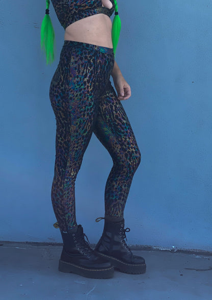  Womens music fesival fashion - Festival-outfit-rave-outfit - handmade-in-Brooklyn-New York City-custom made-waste conscious– retro style – hippie fashion –rave bralette top – festival bottoms – festival pants – rave leggings – spandex stretch – full length - radioactive print - leopard print - female model 