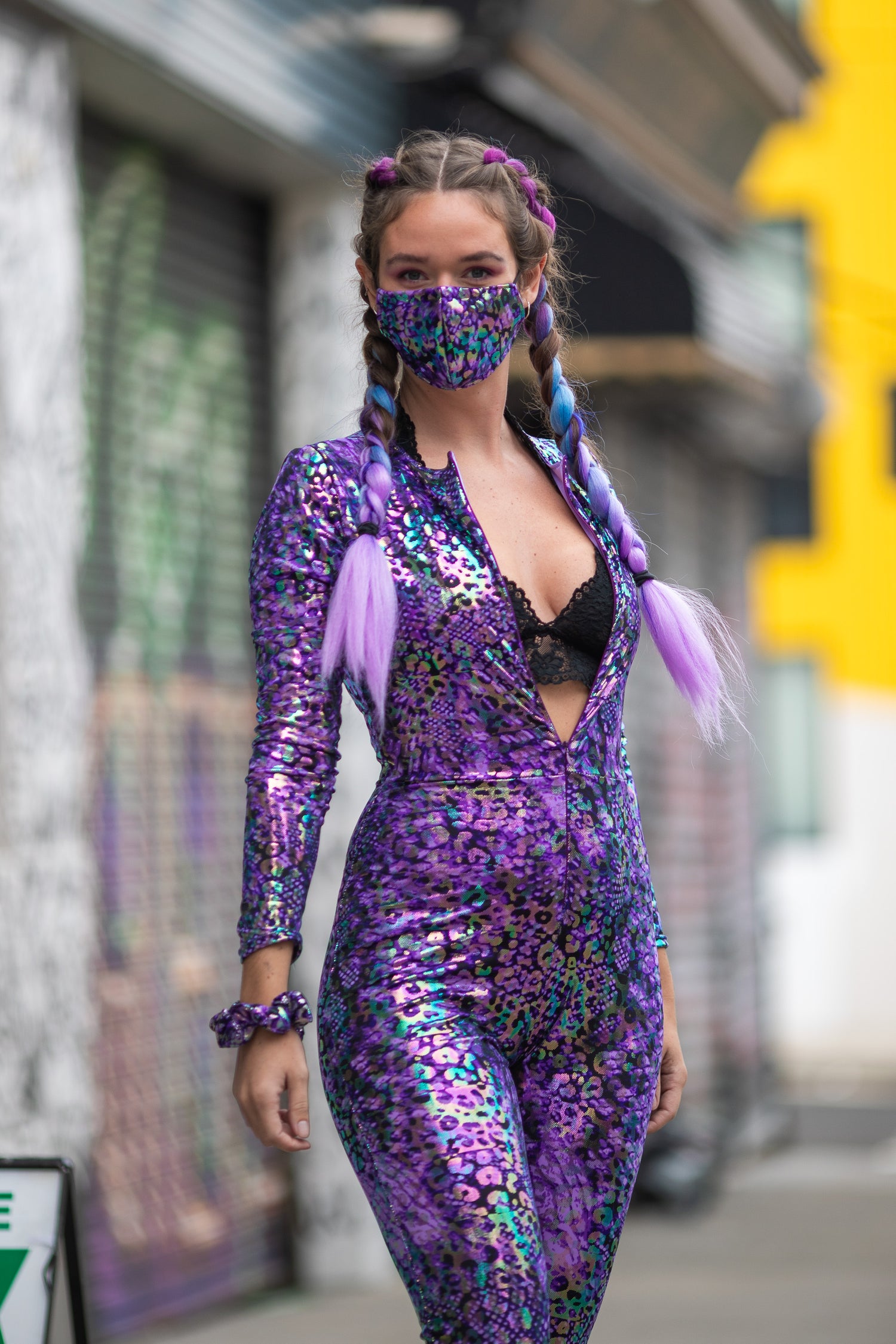 Unisex-music fesival fashion - Festival-outfit-rave-outfit - handmade-in-Brooklyn-New York City-custom made-waste conscious – psychedelic fashion – retro style – hippie fashion –handmade – womens festival fashion – Zip Front Catsuit – full bodysuit – onesies – full body costumes – womens rave fashion - leopard purple sparkle - close up on model